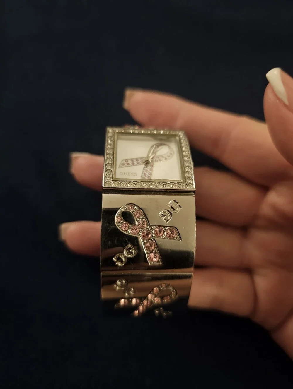 GUESS Women's Silver Tone Pink Ribbon Crystal Bracelet Watch